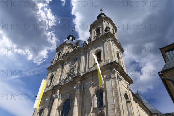 Parish and pilgrimage church of the Holy Trinity, basilica in Gößweinstein with pilgrimage flags, Upper Franconia, Bavaria, Germany, Europe