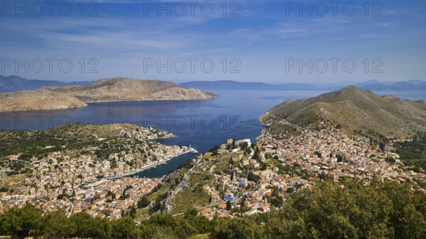 Wide island panorama with deep blue sea and sky, emphasises a peaceful atmosphere, Symi Town, Symi, Dodecanese, Greek Islands, Greece, Europe