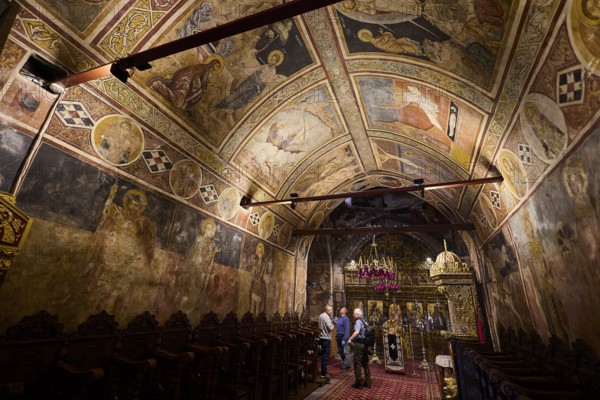 Church interior with detailed wall frescoes and vaulted ceiling, rich religious decorations, Thari Monastery, Moni Thari, near Gadouras Reservoir, remote mountain region, Rhodes, Dodecanese, Greek Islands, Greece, Europe