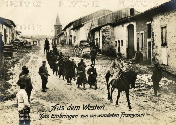 From the West. Bringing in wounded Frenchmen, 1914 - 1918, World War I, reproduction of a war postcard