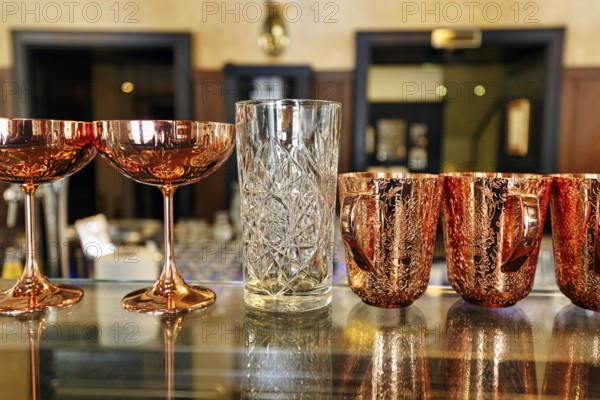 Various decorated glasses on a counter, classic coffee house, Central Grand Café, bar, Budapest, Hungary, Europe