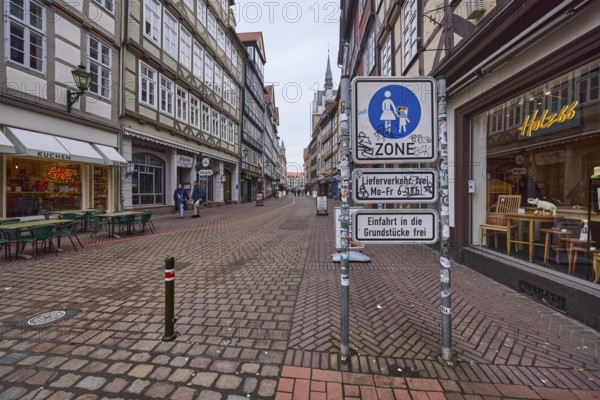 Pedestrian zone, café, furniture shop, pub, half-timbered houses, bollards, diffuse light, cloudy, Kramerstraße, Hanover, state capital, Hanover region, Lower Saxony, Germany, Europe