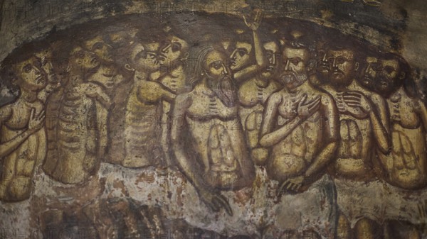 An oppressive scene in a fresco with skeletons and suffering figures in a cramped crowd situation, Easter 2025, Church of the Dormition of the All-Holy God Bear, Kimisis tis Theotokou, Asklipio, Rhodes, Dodecanese, Greek Islands, Greece, Europe
