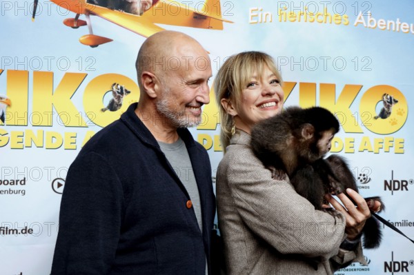 Benno Fürmann and Heike Makatsch at the Berlin premiere of AKIKO - DER FLIEGENDE AFFE at the Filmtheater am Friedrichshain in Berlin on 25 May 2025