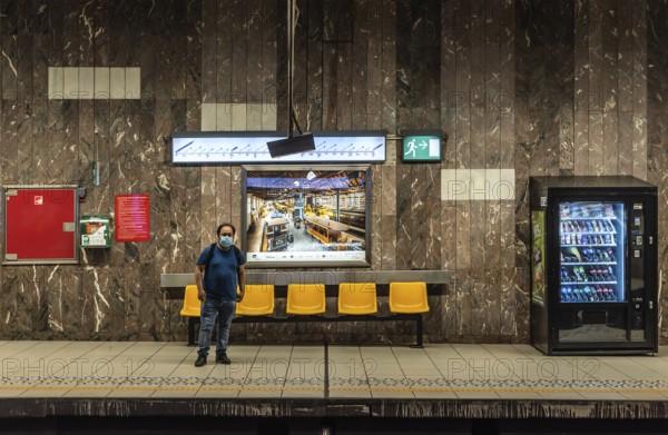 Ixelles, Brussels, Belgium, 03 30 2019 People of Mixed-races waiting for the underground metro at the Louisa local train stop, Europe