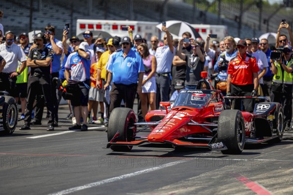 INDYCAR driver, WILL POWER (12) of Toowoomba, Australia, brings his Team Penske Chevrolet car in for a pit stop during the Pit Stop Competition at the Indianapolis Motor Speedway in Indianapolis, IN, USA, Oceania