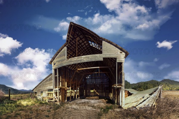 An Abandoned Barn with Blue Clouds and Sky, Color Image, USA, North America
