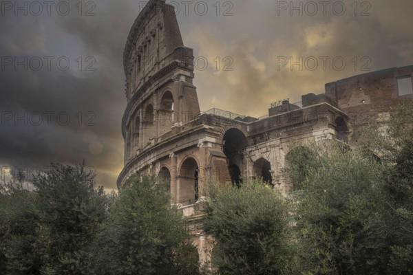 Rainy weather in the morning, sunrise in an ancient historic city and the sight of the Colosseum, Rome, Italy, Europe