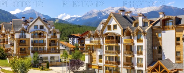 Bansko, Bulgaria summer view with houses and Pirin peaks banner panorama