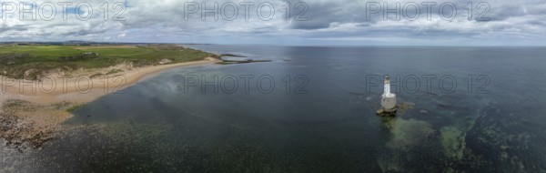 Lighthouse in the sea, drone shot, Rattray Head Lighthouse, Peterhead, Aberdeenshire, Scotland, Great Britain