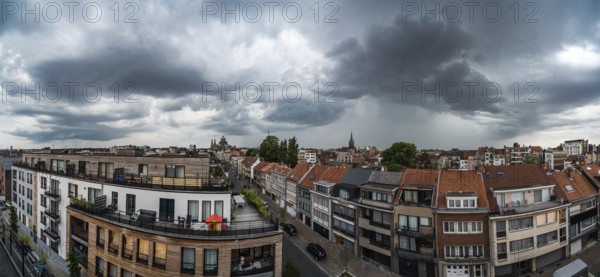 Jette, Brussels Capital Region, Belgium, 11 2 2019, View over a modern apartment block with the Basilica of the Sacred Heart in the background, Europe