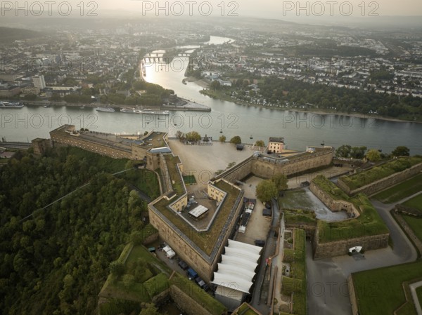 Ehrenbreitstein Fortress is situated 118 metres above the Rhine opposite the mouth of the Moselle with the Deutsches Eck in Koblenz. Ehrenbreitstein Fortress, the second largest preserved fortress in Europe, was built in its present form between 1817 and 1828. Koblenz, Rhineland-Palatinate, Germany, Europe