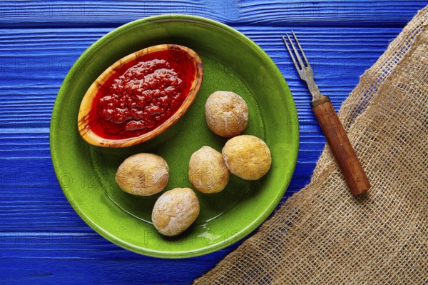 Papas arrugas al mojo wrinkled potatoes Canary islands recipe red spicy sauce