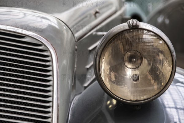 Headlight of old vintage car close-up
