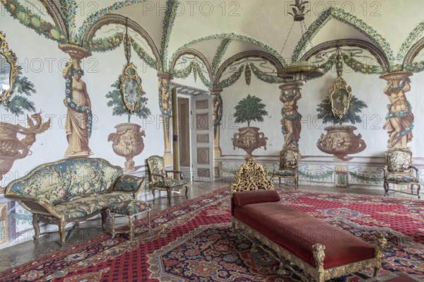 Masino, Italy, April 2023: baroque livingroom in old castle. Vintage interior, original from 18th Century, Europe