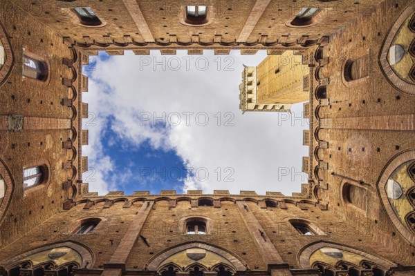 Detail of the Palazzo Pubblico town hall in Siena, Italy, Europe