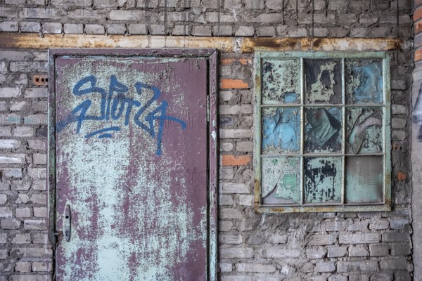 Dilapidated facades on the old shipyard site in Gdansk