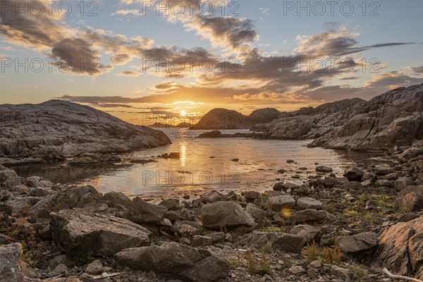Golden sunset over a small bay
