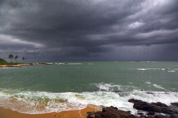 Beautiful sea stormy landscape over rocky coastline in Indian ocean