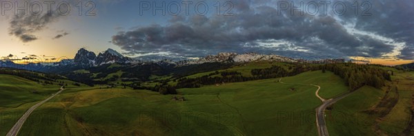 Panoramic view from the Seiser Alm to the Dolomites in Italy, drone shot