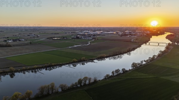 Fields and river (Danube) at dusk with setting sun, picturesque landscape, Bogen, Lower Bavaria, drone shot