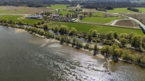 Green banks with numerous trees, behind which a village and wide fields extend, Bogen, Lower Bavaria
