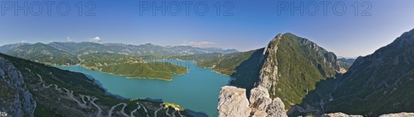 Bovilla reservoir near the capital of Tirana with setting sun in the back
