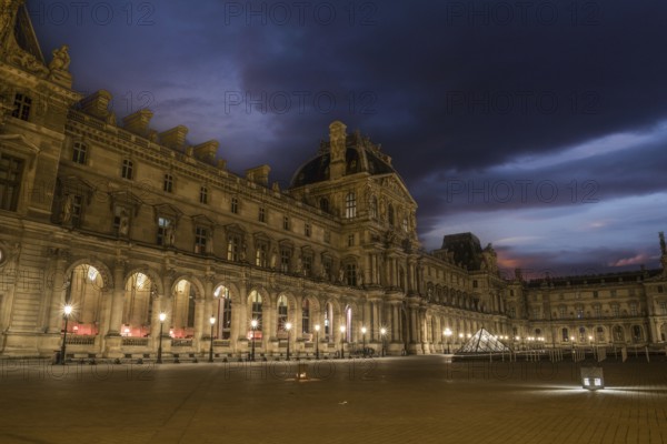 PARIS, FRANCE, MAY 13, 2022, The famous Parisian Louvre Palace at dawn, France, Europe