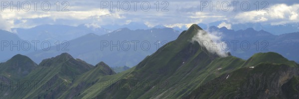 Cloud hanging on Mount Tannhorn and Rothorn Ridge, Switzerland, Europe