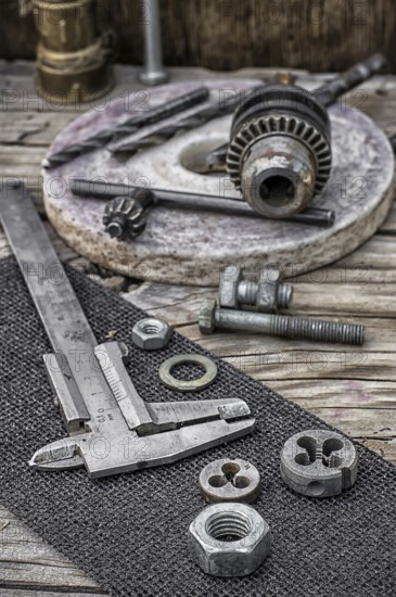 Set of old tools of the keys, screws and drills Selective focus