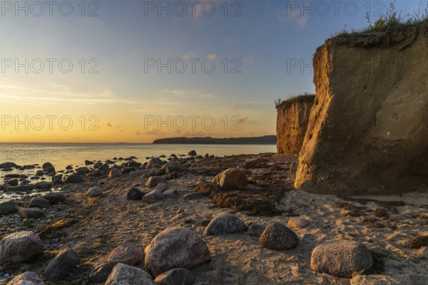 Evening light over the beach and cliffs in Klein Zicker, Mecklenburg-Western Pomerania, Germany, Europe
