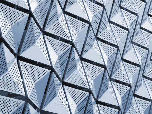 Blue toned metallic geometric architectural cladding panels
