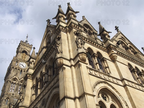 Close up view of bradford city hall in west yorkshire a victorian gothic revival sandstone building with statues and clock tower