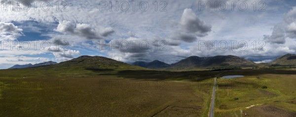 Drone panorama landscape of Connemara National Park and the Twelve Bens mountains in western Ireland