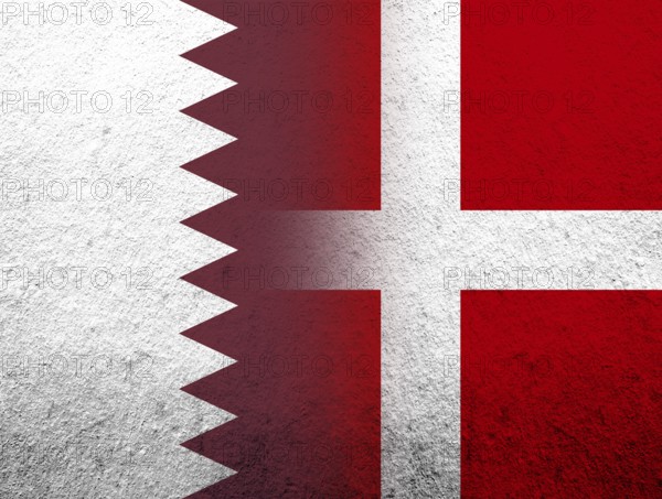 The Kingdom of Denmark National flag with The State of Qatar National flag. Grunge Background