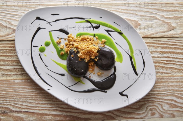 Molecular gastonomy cuttlefish roes with citrus mayonnaise