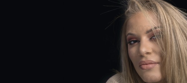 Sensual beautiful blonde woman, beautiful blue-eyed woman. Professional Make-up