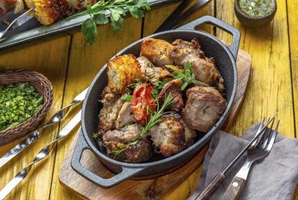 Food, Food, Bbq grilled meat, pork, chicken and vegetable on cast iron pan. Grilled skewers on yellow wooden background. Top view