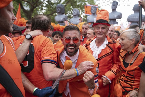 06/07/2024, Berlin, Germany, Europe, Fans of the Dutch national football team celebrate on a fan walk in front of the quarter-final match against Turkey during the European Football Championship UEFA EURO 2024, Europe