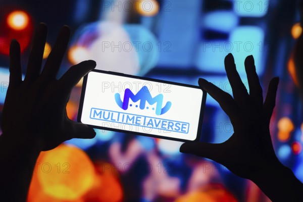 In this photo illustration, the MultiMetaVerse Holdings Limited logo is displayed on a smartphone screen