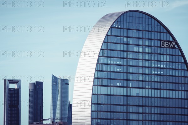 Madrid, Spain, June 19, 2021: City BBVA. Headquarters of BBVA bank in Las Tablas district. La Vela Building designed by Herzog and de Meuron. Finance, business and banking concepts, Europe