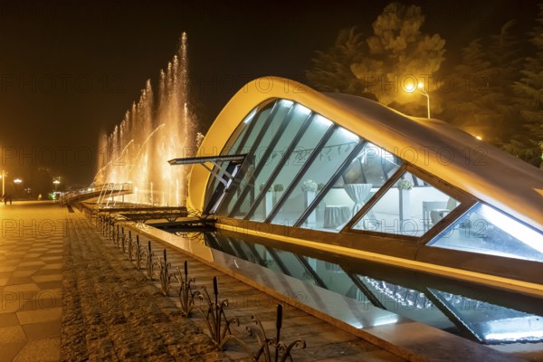 Night view of the modern pavilion and the fountain on Batumi Boulevard