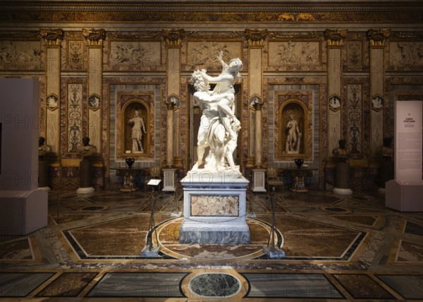 Rome, Italy, 28 December 2023: The Rape of Proserpina by Gian Lorenzo Bernini, 1622. Baroque marble sculpture in Galleria Borghese, Europe