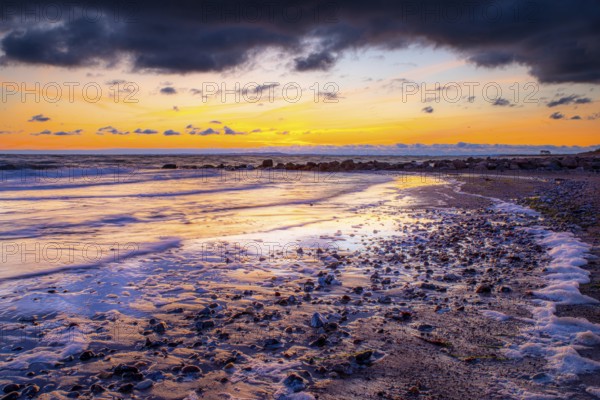 Sunrise on the seaside of the East Sea at sunrise with a colourful sky and long exposure. Beautiful landscape a the seaside of the East Sea at sunrise with a colourful sky