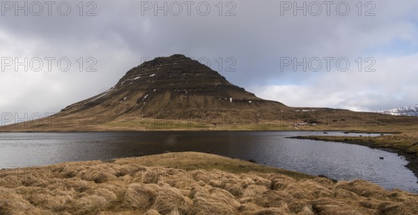 Dramatic Icelandic landscaspe with Kirkjufell mountain, at Grundarfjordur, on the Snaefellsnes peninsula in Iceland