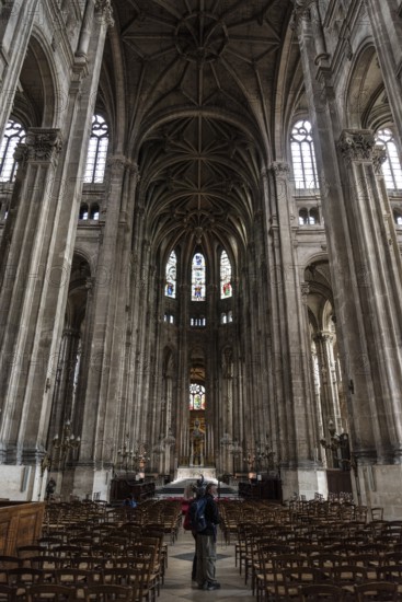 PARIS, FRANCE, MAY 24, 2022, Tall columns and beautifully ornate ceiling in the gothic church Saint Eustache in Paris, France, Europe