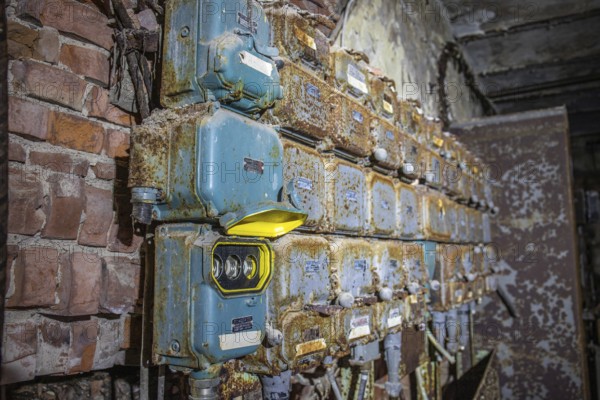 Old abandoned paper factory. Historic and typical factory building as a lost place. Destruction and decay are damaging the substance. Original machines and objects can be found here in Sweden