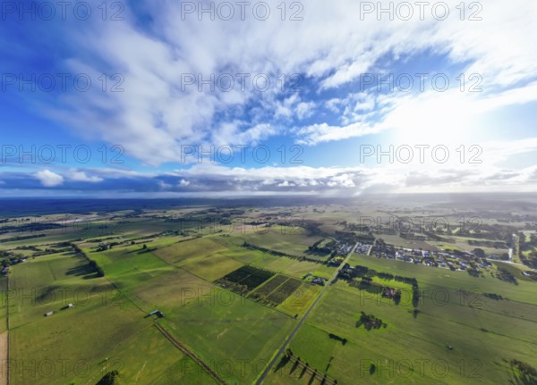 Countryside of Ob Flat around the rural town of Mt Gambier and its famous Blue Lake crater on a sunny autumn day in South Australia, Australia, Oceania