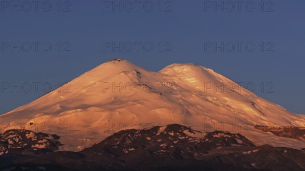 Beautiful view of Mount Elbrus at sunrise, North Caucasus mountains, Russia, Europe