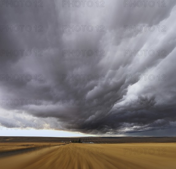 Thunderstorm above fields after harvesting. A Mirage on high speed